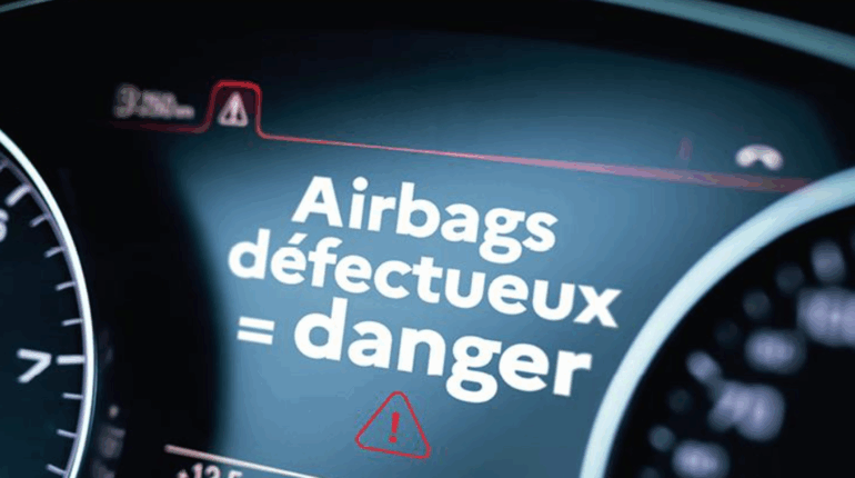Tableau de bord de voiture affichant un message d’alerte : « Airbags défectueux = danger ».